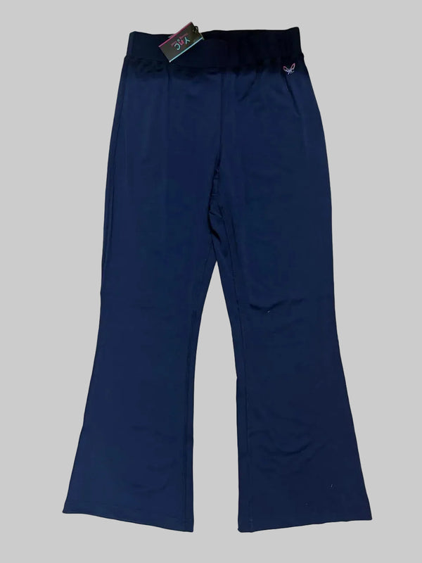 Navy blue pants on a tiled floor with a tag attached.