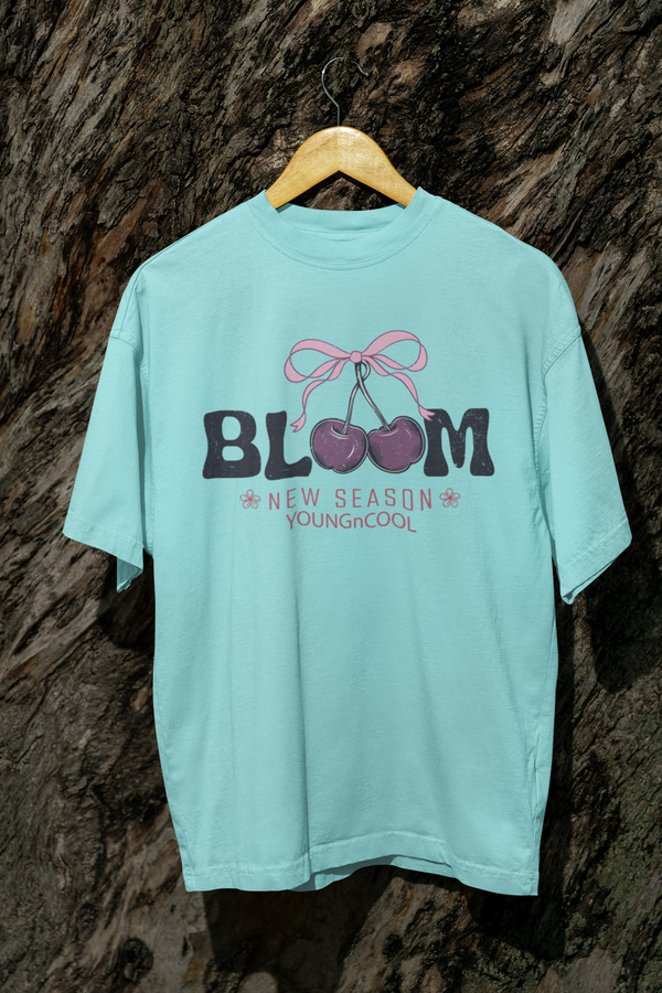 Teen girl wearing oversized graphic t-shirt with 'Bloom Image' design – streetwear style by YoungnCool - YnCLife