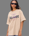Teen girl wearing oversized graphic t-shirt with 'Bloom Image' design – streetwear style by YoungnCool - YnCLife