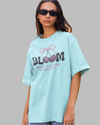 Teen girl wearing oversized graphic t-shirt with 'Bloom Image' design – streetwear style by YoungnCool - YnCLife