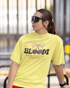 Teen girl wearing oversized graphic t-shirt with 'Bloom Image' design – streetwear style by YoungnCool - YnCLife