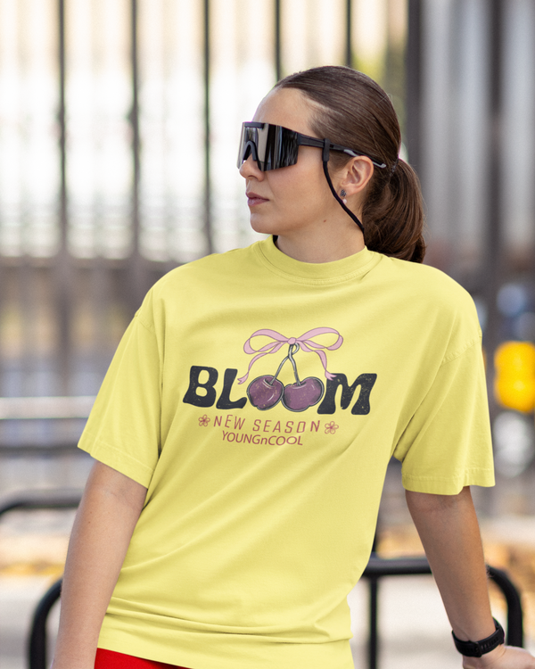 Teen girl wearing oversized graphic t-shirt with 'Bloom Image' design – streetwear style by YoungnCool - YnCLife