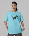 Teen girl wearing oversized graphic t-shirt with 'Book Nerd' design – streetwear style by YoungnCool-YnClife
