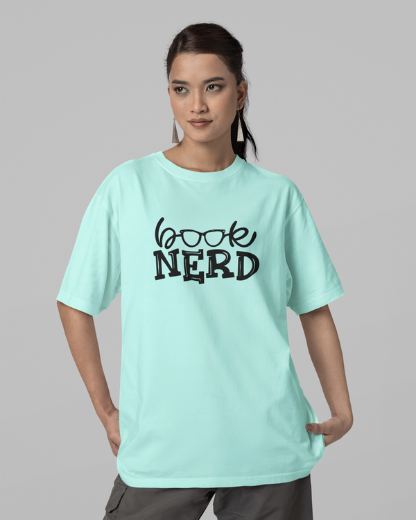 Teen girl wearing oversized graphic t-shirt with 'Book Nerd' design – streetwear style by YoungnCool-YnClife