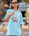 Teen girl wearing oversized graphic t-shirt with 'Cherry Bliss' design – streetwear style by YoungnCool-YnCLife
