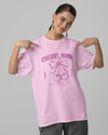 Teen girl wearing oversized graphic t-shirt with 'Cherry Bomb' design – streetwear style by YoungnCool-YnCLife