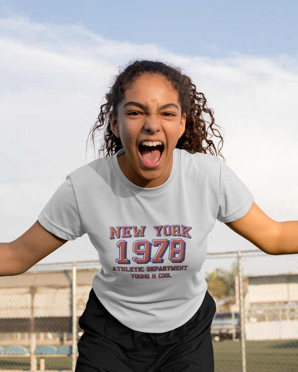 Teen girl wearing graphic t-shirt with 'New York City Print' design – streetwear style by YoungnCool-YnCLife