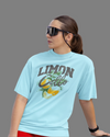 Teen girl wearing oversized graphic t-shirt with 'Lemons Print' design – streetwear style by YoungnCool YnCLife