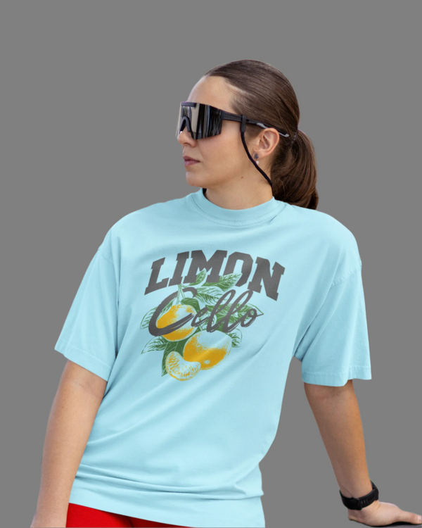 Teen girl wearing oversized graphic t-shirt with 'Lemons Print' design – streetwear style by YoungnCool YnCLife