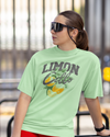 Teen girl wearing oversized graphic t-shirt with 'Lemons Print' design – streetwear style by YoungnCool YnCLife
