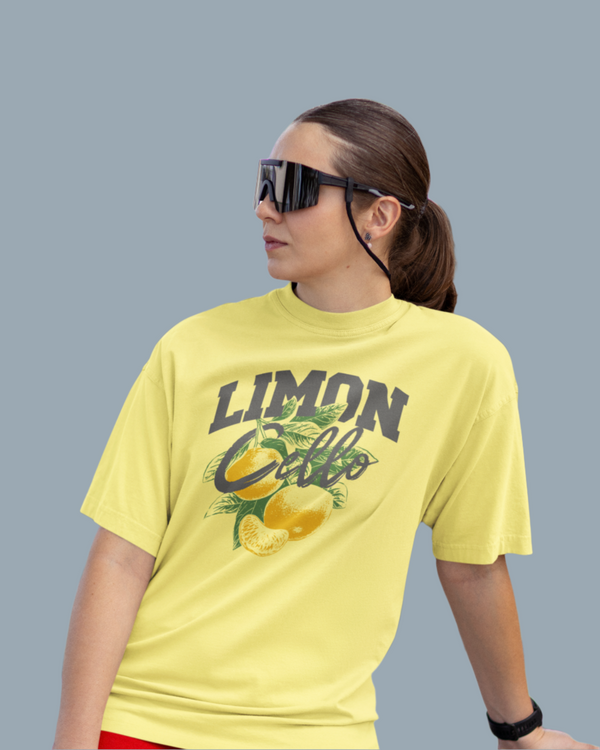 Teen girl wearing oversized graphic t-shirt with 'Lemons Print' design – streetwear style by YoungnCool YnCLife