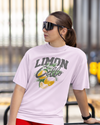 Teen girl wearing oversized graphic t-shirt with 'Lemons Print' design – streetwear style by YoungnCool YnCLife