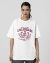 Teen girl wearing oversized graphic t-shirt with 'LA Print' design – streetwear style by YoungnCool.