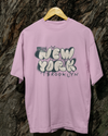 Teen girl wearing oversized graphic t-shirt with 'New York City Print' design – streetwear style by YoungnCool YnCLife