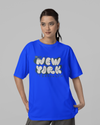 Teen girl wearing oversized graphic t-shirt with 'New York City Print' design – streetwear style by YoungnCool YnCLife