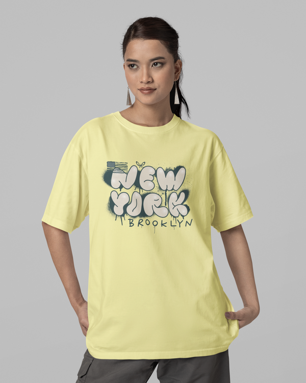 Teen girl wearing oversized graphic t-shirt with 'New York City Print' design – streetwear style by YoungnCool YnCLife