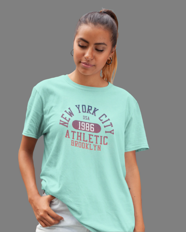 Teen girl wearing blue oversized graphic t-shirt with 'New York City Print' design – streetwear style by YoungnCool.