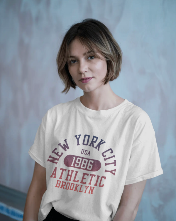 Teen girl wearing blue oversized graphic t-shirt with 'New York City Print' design – streetwear style by YoungnCool.