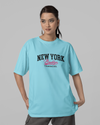 Teen girl wearing oversized graphic t-shirt with 'NY Brooklyn Print' design – streetwear style by YoungnCool YnCLife