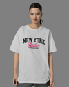 Teen girl wearing oversized graphic t-shirt with 'NY Brooklyn Print' design – streetwear style by YoungnCool YnCLife