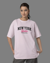 Teen girl wearing oversized graphic t-shirt with 'NY Brooklyn Print' design – streetwear style by YoungnCool YnCLife