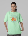Teen girl wearing oversized graphic t-shirt with 'Oranges Image' design – streetwear style by YoungnCool-YnCLife