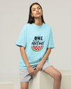Teen girl wearing oversized graphic t-shirt with 'one in a Melon ' design – streetwear style by YoungnCool-YnCLife