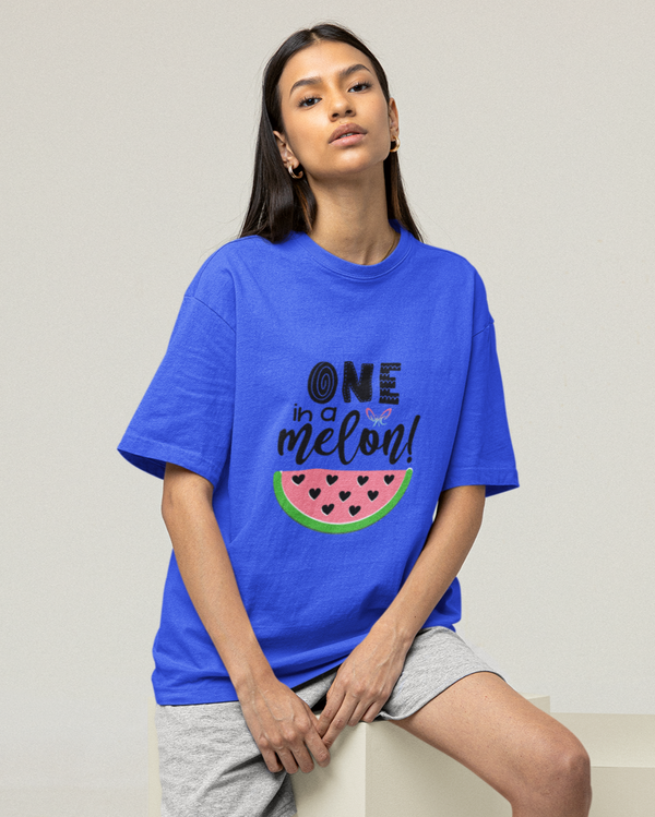 Teen girl wearing oversized graphic t-shirt with 'one in a Melon ' design – streetwear style by YoungnCool-YnCLife