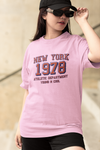 Teen girl wearing oversized graphic t-shirt with 'New York City Print' design – streetwear style by YoungnCool-YnCLife