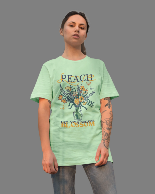 Teen girl wearing oversized graphic t-shirt with 'Peach Print' design – streetwear style by YoungnCool-YnCLife