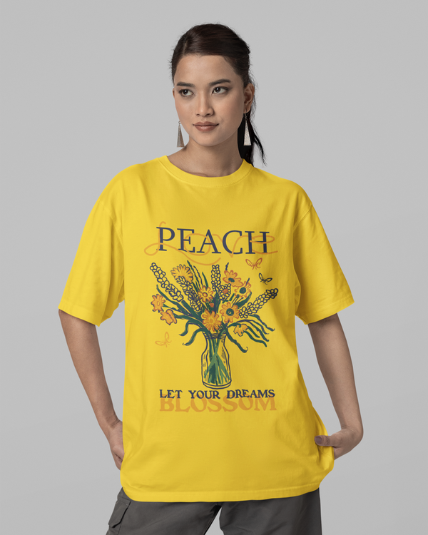Teen girl wearing oversized graphic t-shirt with 'Peach Print' design – streetwear style by YoungnCool-YnCLife