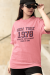 Teen girl wearing oversized graphic t-shirt with 'New York City Print' design – streetwear style by YoungnCool-YnCLife