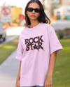 Teen girl wearing oversized graphic t-shirt with 'Rock Star' design – streetwear style by YoungnCool YnCLife