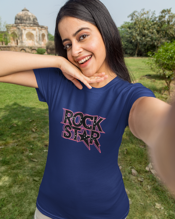 Teen girl wearing oversized graphic t-shirt with 'Rock Star' design – streetwear style by YoungnCool.