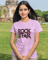 Teen girl wearing oversized graphic t-shirt with 'Rock Star' design – streetwear style by YoungnCool.