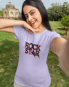 Teen girl wearing oversized graphic t-shirt with 'Rock Star' design – streetwear style by YoungnCool.
