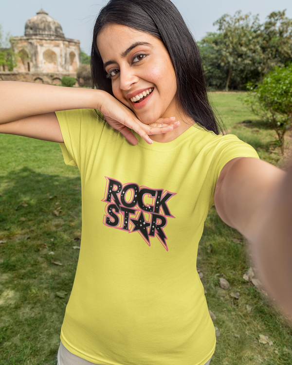 Teen girl wearing oversized graphic t-shirt with 'Rock Star' design – streetwear style by YoungnCool.