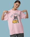 Teen girl wearing oversized graphic t-shirt with 'Say Cheese' design – streetwear style by YoungnCool YnCLife