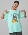 Teen girl wearing oversized graphic t-shirt with 'Say Cheese' design – streetwear style by YoungnCool YnCLife