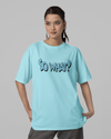 Teen girl wearing oversized graphic t-shirt with 'So What? Quote' design – streetwear style by YoungnCool YnCLife
