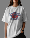 Teen girl wearing oversized graphic t-shirt with design – streetwear style by YoungnCool.