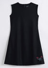 Black sleeveless dress with a butterfly design on a white background