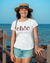 Teen girl wearing graphic t-shirt with 'Chic Quote' design – streetwear style by YoungnCool.