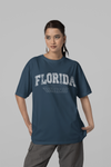 Teen girl wearing oversized graphic t-shirt with 'Florida Print' design – streetwear style by YoungnCool YnCLife