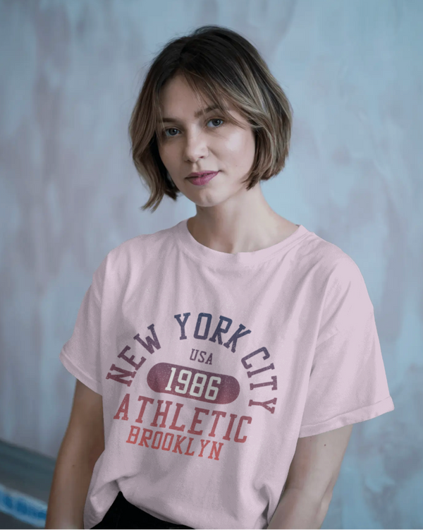 Teen girl wearing blue oversized graphic t-shirt with 'New York City Print' design – streetwear style by YoungnCool.