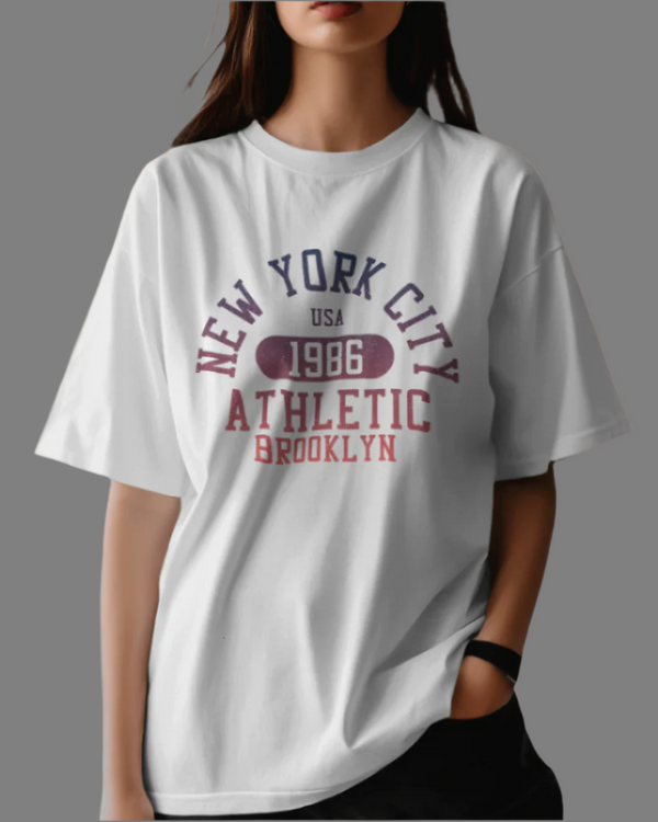 Teen girl wearing oversized white graphic t-shirt with 'New York City Print' design – streetwear style by YoungnCool.