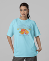 Teen girl wearing oversized graphic t-shirt with 'Oranges Image' design – streetwear style by YoungnCool-YnCLife