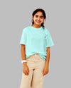 Teen girl wearing oversized solid t-shirt streetwear style by YoungnCool-YnCLife
