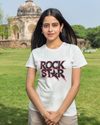 Teen girl wearing oversized graphic t-shirt with 'Rock Star' design – streetwear style by YoungnCool.