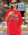 Teen girl wearing oversized graphic t-shirt with 'Serial Chiller' design – streetwear style by YoungnCool-YnCLife